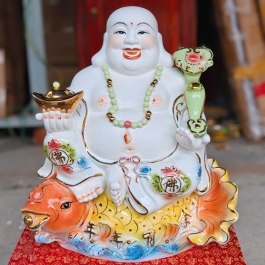 Tượng Di Lặc men sứ ngồi trên cá chép hóa rồng cao 43cm